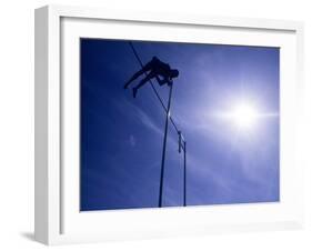 Silhouette of a Pole Vaulter in Action-null-Framed Photographic Print