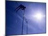 Silhouette of a Pole Vaulter in Action-null-Mounted Photographic Print