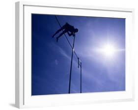 Silhouette of a Pole Vaulter in Action-null-Framed Photographic Print