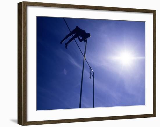 Silhouette of a Pole Vaulter in Action-null-Framed Photographic Print