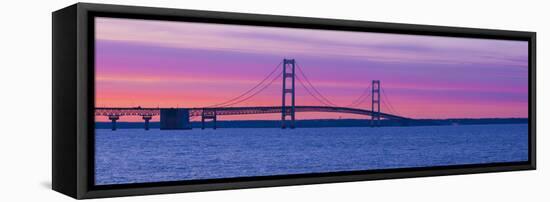 Silhouette of a Suspension Bridge at Sunset, Mackinac Bridge, Michigan, USA-null-Framed Stretched Canvas