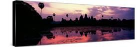 Silhouette of a Temple at Dusk, Angkor Wat, Siem Reap, Angkor, Cambodia-null-Stretched Canvas