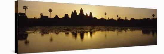 Silhouette of a Temple at Sunrise, Angkor Wat, Cambodia-null-Stretched Canvas