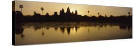Silhouette of a Temple at Sunrise, Angkor Wat, Cambodia-null-Stretched Canvas