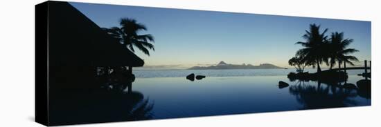 Silhouette of a Tourist Resort, Tahiti Beachcomber Resort, Papeete, Tahiti, French Polynesia-null-Stretched Canvas