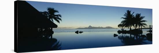 Silhouette of a Tourist Resort, Tahiti Beachcomber Resort, Papeete, Tahiti, French Polynesia-null-Stretched Canvas