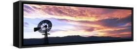 Silhouette of an American-style windmill at sunset, near Salton City, California, USA-Panoramic Images-Framed Stretched Canvas