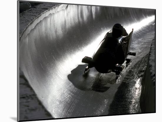 Silhouette of Bobsled in Action, Park City, Utah, USA-Chris Trotman-Mounted Photographic Print