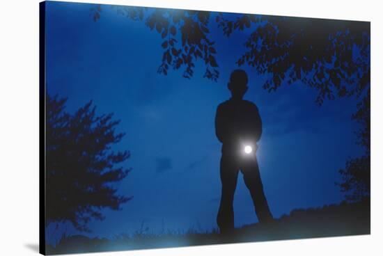 Silhouette of Boy Holding Flashlight-William P. Gottlieb-Stretched Canvas