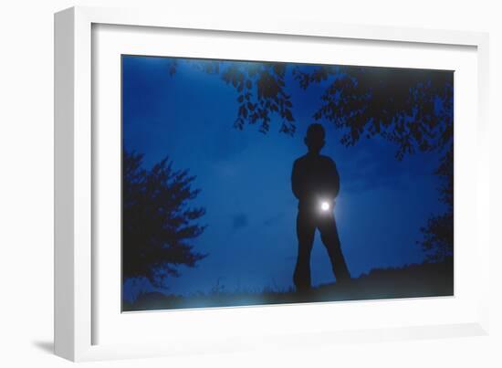 Silhouette of Boy Holding Flashlight-William P. Gottlieb-Framed Photographic Print