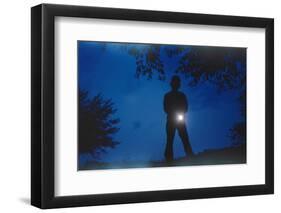 Silhouette of Boy Holding Flashlight-William P. Gottlieb-Framed Photographic Print