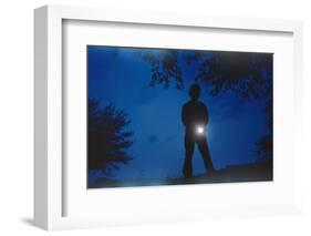 Silhouette of Boy Holding Flashlight-William P. Gottlieb-Framed Photographic Print