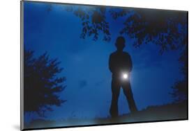 Silhouette of Boy Holding Flashlight-William P^ Gottlieb-Mounted Photographic Print