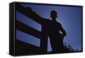 Silhouette of Boy Leaning Against Fence-William P. Gottlieb-Framed Stretched Canvas