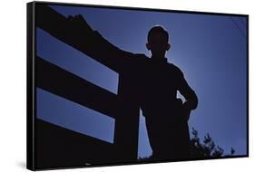 Silhouette of Boy Leaning Against Fence-William P. Gottlieb-Framed Stretched Canvas
