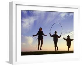 Silhouette of Children Jumping Rope Outdoors-Mitch Diamond-Framed Premium Photographic Print