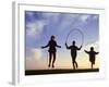 Silhouette of Children Jumping Rope Outdoors-Mitch Diamond-Framed Photographic Print