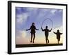 Silhouette of Children Jumping Rope Outdoors-Mitch Diamond-Framed Photographic Print