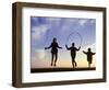 Silhouette of Children Jumping Rope Outdoors-Mitch Diamond-Framed Photographic Print