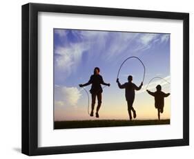 Silhouette of Children Jumping Rope Outdoors-Mitch Diamond-Framed Photographic Print