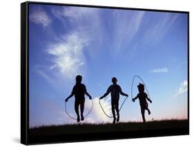 Silhouette of Children Playing Outdoors-Mitch Diamond-Framed Stretched Canvas