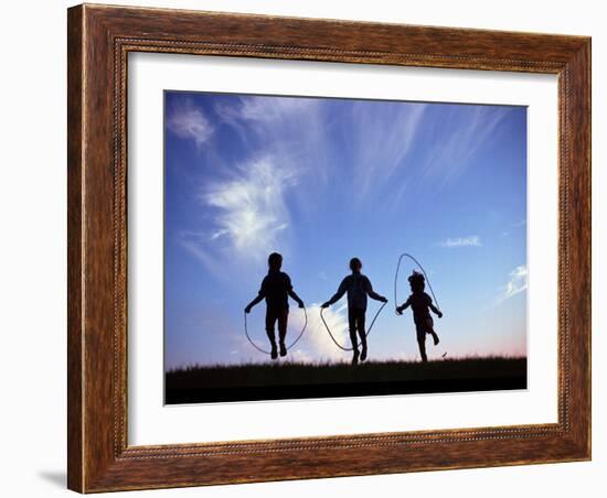 Silhouette of Children Playing Outdoors-Mitch Diamond-Framed Photographic Print