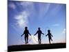 Silhouette of Children Playing Outdoors-Mitch Diamond-Mounted Photographic Print