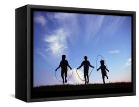 Silhouette of Children Playing Outdoors-Mitch Diamond-Framed Stretched Canvas