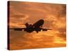 Silhouette of Commercial Airplane at Sunset-Mitch Diamond-Stretched Canvas