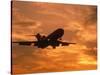 Silhouette of Commercial Airplane at Sunset-Mitch Diamond-Stretched Canvas