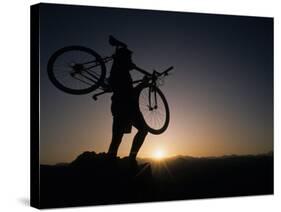 Silhouette of Cyclistist at Sunrise, Boulder, Colorado, USA-null-Stretched Canvas