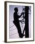 Silhouette of Engineer Working up a Telegraph Pole, East Sussex, England, United Kingdom-Ruth Tomlinson-Framed Photographic Print