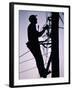 Silhouette of Engineer Working up a Telegraph Pole, East Sussex, England, United Kingdom-Ruth Tomlinson-Framed Photographic Print