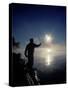 Silhouette of Fisherman Casting a Line into Lake, Ontario, Canada-Mark Carlson-Stretched Canvas