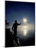 Silhouette of Fisherman Casting a Line into Lake, Ontario, Canada-Mark Carlson-Mounted Photographic Print