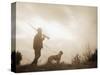 Silhouette of Hunter with Bird Dog under Clouds-Philip Gendreau-Stretched Canvas