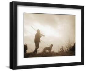 Silhouette of Hunter with Bird Dog under Clouds-Philip Gendreau-Framed Photographic Print