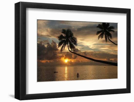 Silhouette of leaning palm trees and a woman at sunrise on Taveuni Island, Fiji, Pacific-Don Mammoser-Framed Photographic Print