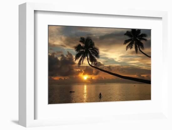 Silhouette of leaning palm trees and a woman at sunrise on Taveuni Island, Fiji, Pacific-Don Mammoser-Framed Photographic Print