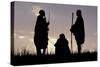 Silhouette of Maasai Warriors, Ngorongoro Crater, Tanzania-Paul Joynson Hicks-Stretched Canvas