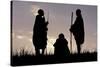 Silhouette of Maasai Warriors, Ngorongoro Crater, Tanzania-Paul Joynson Hicks-Stretched Canvas