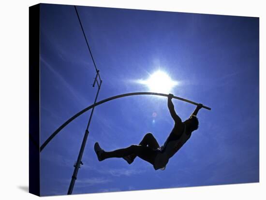 Silhouette of Male Pole Vaulter-Steven Sutton-Stretched Canvas