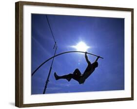 Silhouette of Male Pole Vaulter-Steven Sutton-Framed Photographic Print