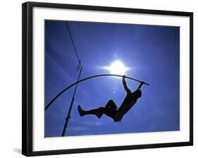 Silhouette of Male Pole Vaulter-Steven Sutton-Framed Photographic Print