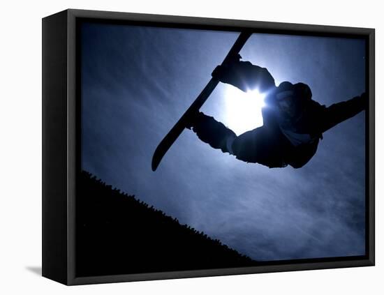 Silhouette of Male Snowboarder Flying over the Vert, Salt Lake City, Utah, USA-Chris Trotman-Framed Stretched Canvas