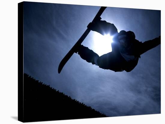 Silhouette of Male Snowboarder Flying over the Vert, Salt Lake City, Utah, USA-Chris Trotman-Stretched Canvas