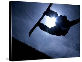 Silhouette of Male Snowboarder Flying over the Vert, Salt Lake City, Utah, USA-Chris Trotman-Stretched Canvas