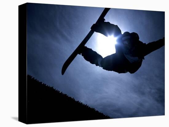 Silhouette of Male Snowboarder Flying over the Vert, Salt Lake City, Utah, USA-Chris Trotman-Stretched Canvas