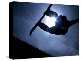 Silhouette of Male Snowboarder Flying over the Vert, Salt Lake City, Utah, USA-Chris Trotman-Stretched Canvas