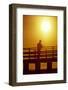 Silhouette of man fishing from a pier.-Stuart Westmorland-Framed Photographic Print